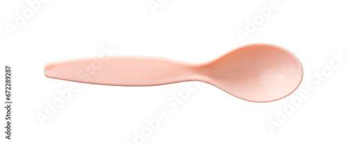 pink spoon for baby isolated photo