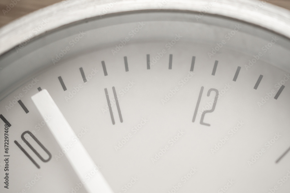 close up of silver metal clock close up of silver metal clock