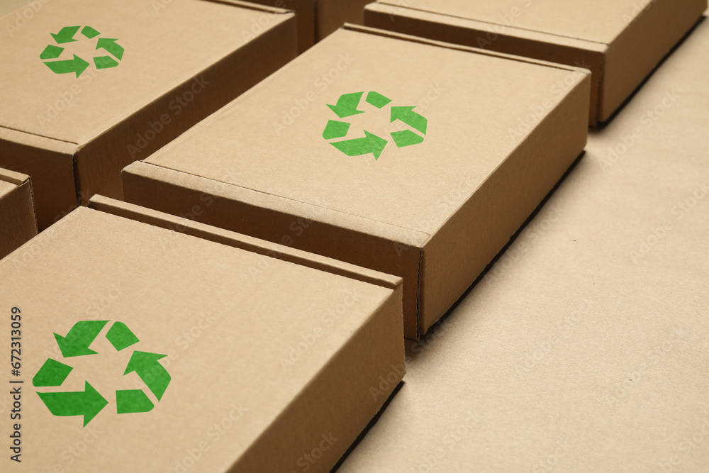 Cardboard boxes with recycle sign stamps on paper Cardboard boxes with recycle sign stamps on paper