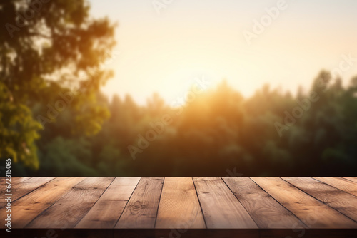Empty wood table against blurry nature background. Useful for product display. Front view.
