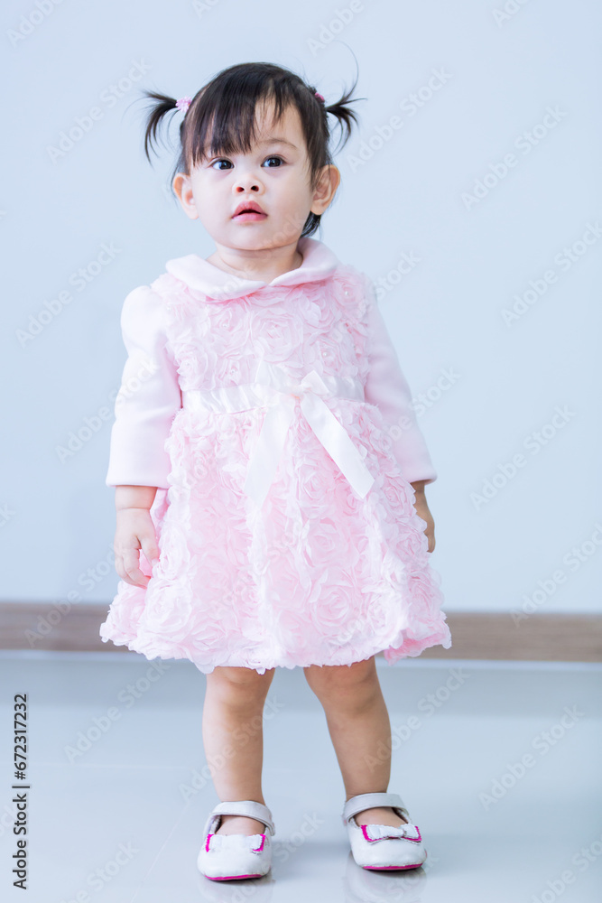 Asian girl in a pink skirt,Little boy dreams of becoming a ballerina in a pink tutu skirt