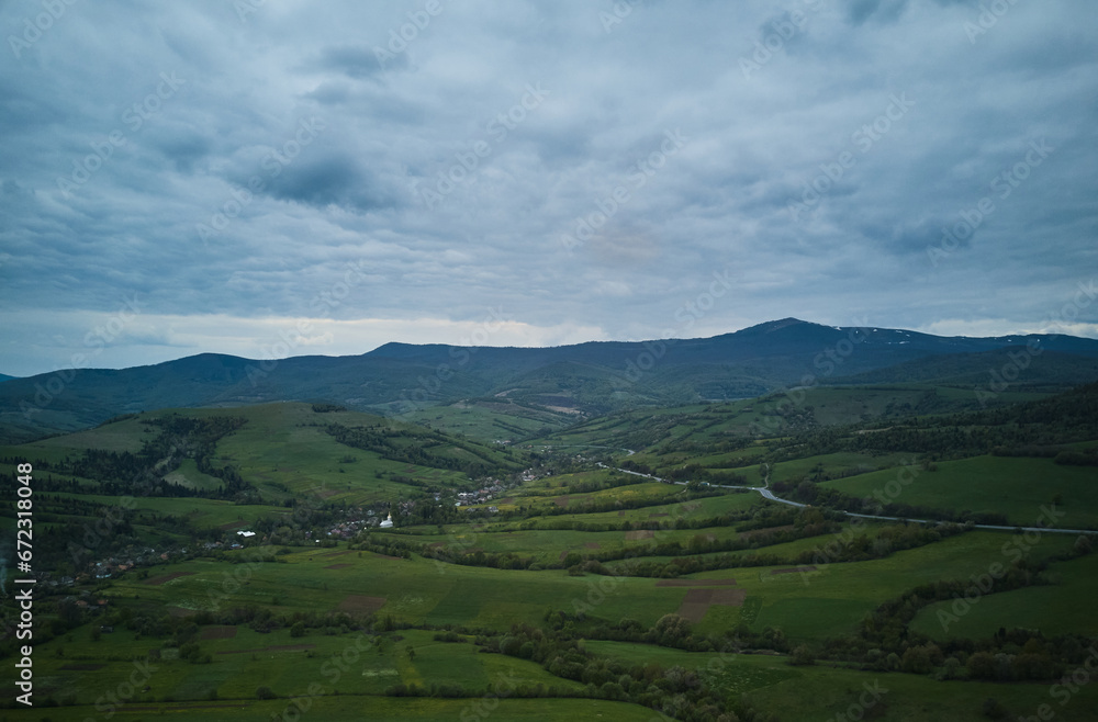 Aerial drone photo of a green valley in Carpathian mountains in Western Ukraine