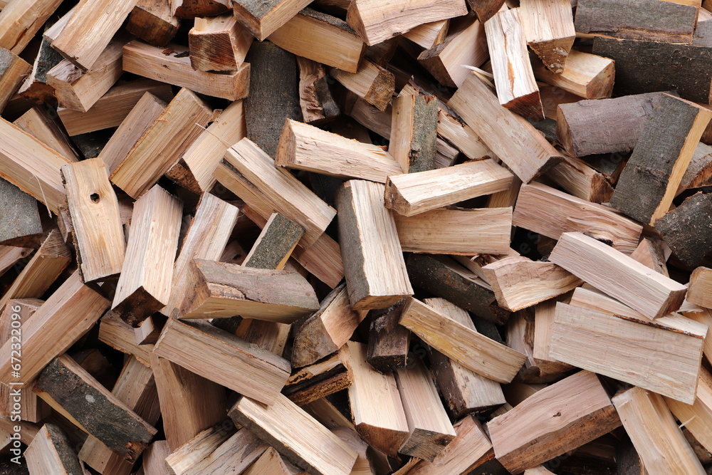 stacked dry firewood as a background stacked dry firewood as a background