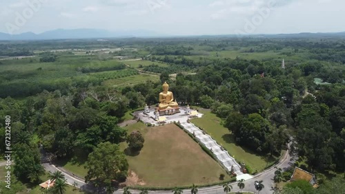 Top view of Phra Buddha Thaksin Mingmongkol Narathiwat and the largest Buddha statue in the southern region of Thailand. photo