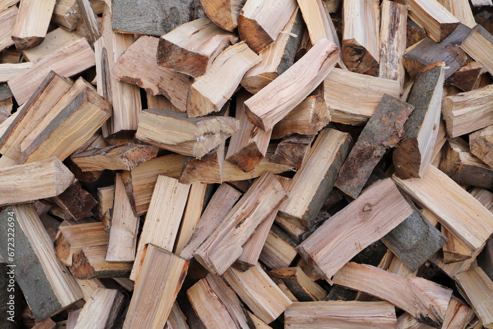 stacked dry firewood as a background stacked dry firewood as a background