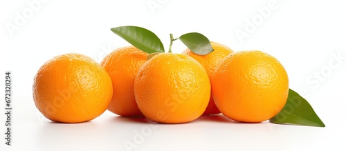 A mandarin that is ready to be consumed separated from any other elements placed upon a background that is completely white