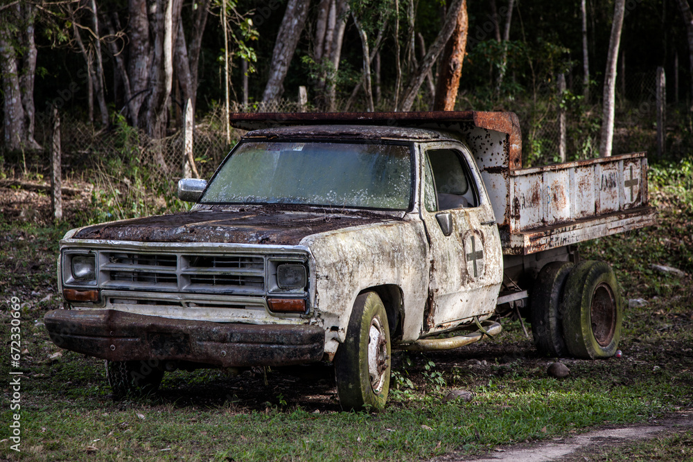 Classic pickup truck abandoned and rusty. Classic pickup truck abandoned and rusty.