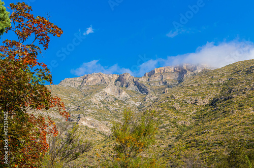 Sunlit Clouds Resting on Wilderness Ridge, McKittrick Canyon, Guadalupe Mountains National Park, Texas, USA