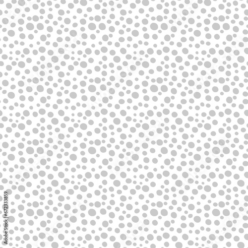 Seamless vector repeat pattern with ditsy white dots on gray. Simple versatile backdrop for baby boy, gender neutral, packaging and more.