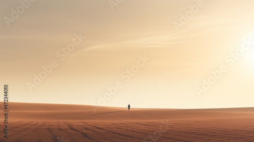 Lone Person Walking on Vast Desert Landscape at Sunset