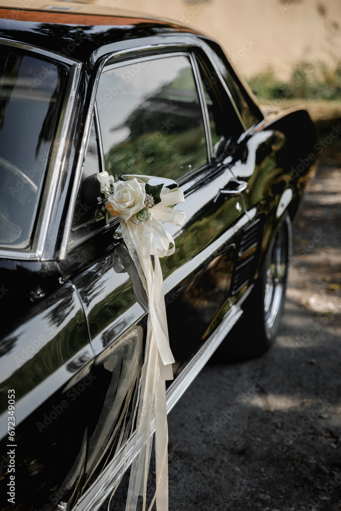 Detailed view of the decorated wedding car