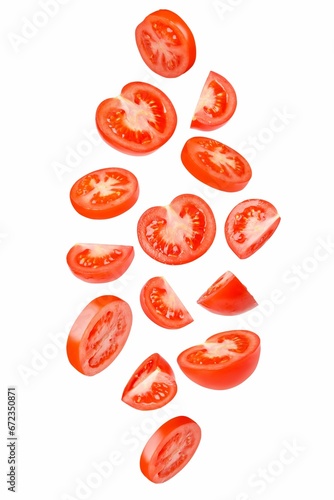 Closeup of sliced juicy tomatoes isolated on white background