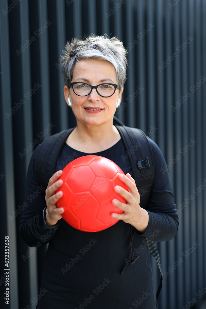 Senior Female Athlete Masters Style, Wellness, and Business in Urban Setting Senior Female Athlete Masters Style, Wellness, and Business in Urban Setting