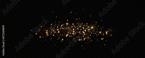 Golden sequins glow with many lights. Glittering dust. Luxurious background of golden particles.	