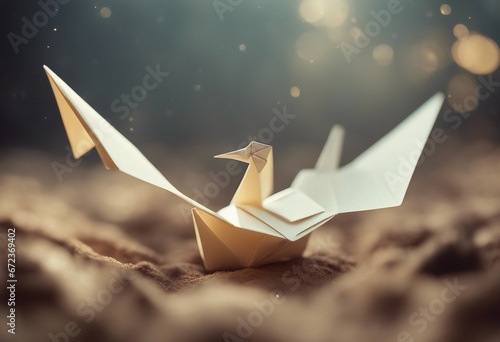 Out Of Nowhere concept of birth or rebirth as an origami bird emerging from a flat paper