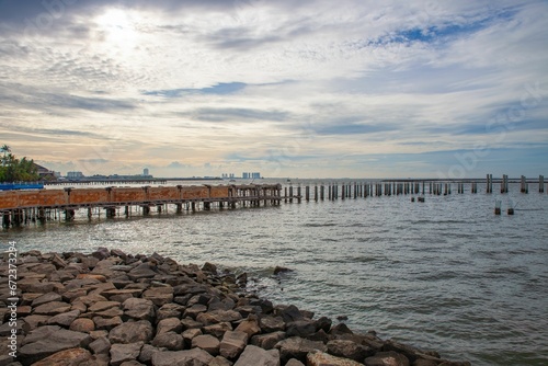 Sea landscape with unfinished piers photo