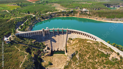 Tableau sur toile Aerial view of the dry spillway of a concrete dam during a long drought