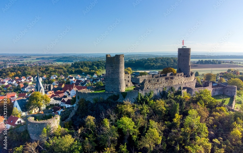 Aerial view of Burg Muenzenberg on a green hill
