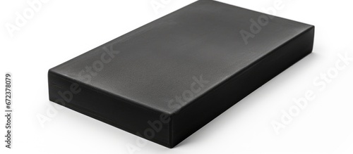 A rectangular black foam made of polyurethane with a white background serving as isolation photo