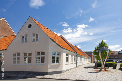 Happy walk through Varde city's old town on a great summer's day. West Jutland, Region Southern Denmark.	
 photo