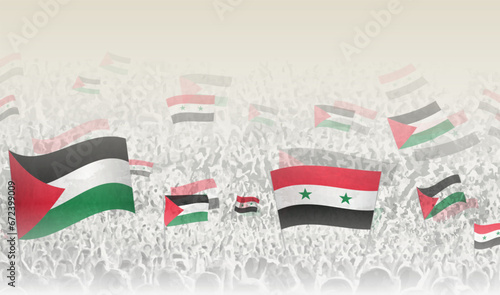 Palestine and Syria flags in a crowd of cheering people.