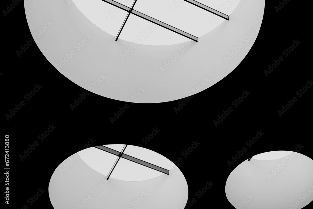three white round discs are set up doncasterally with four different angles three white round discs are set up doncasterally with four different angles