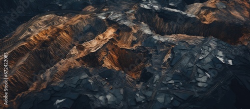 A view from above of a mining operation that involves removing layers of soil or rock