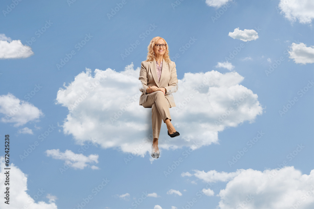 Professional mature woman with glasses sitting on a cloud Professional mature woman with glasses sitting on a cloud