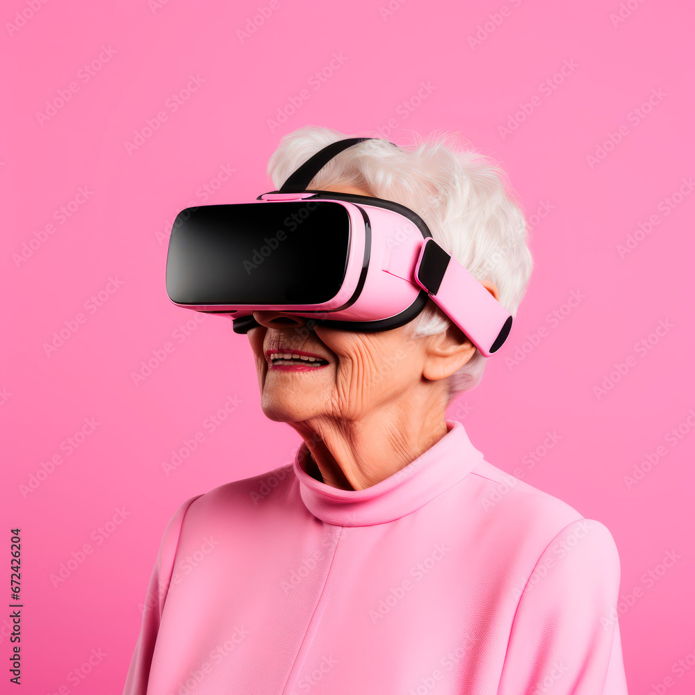 An elderly woman in virtual glasses. Pink background. An elderly woman in virtual glasses. Pink background.