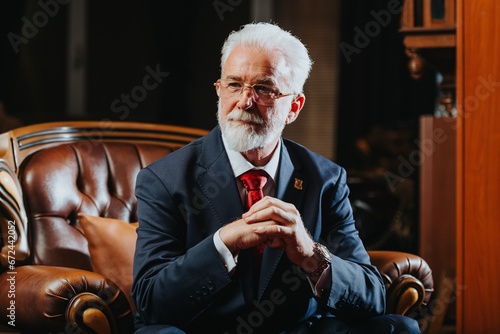 Canvas-taulu Experienced University Rector Posing Confidently In Modern Faculty Office