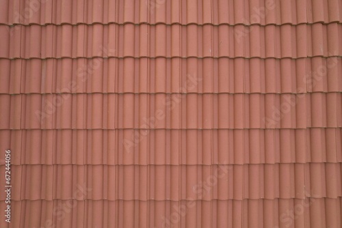 Closeup of orange tiles on the roof