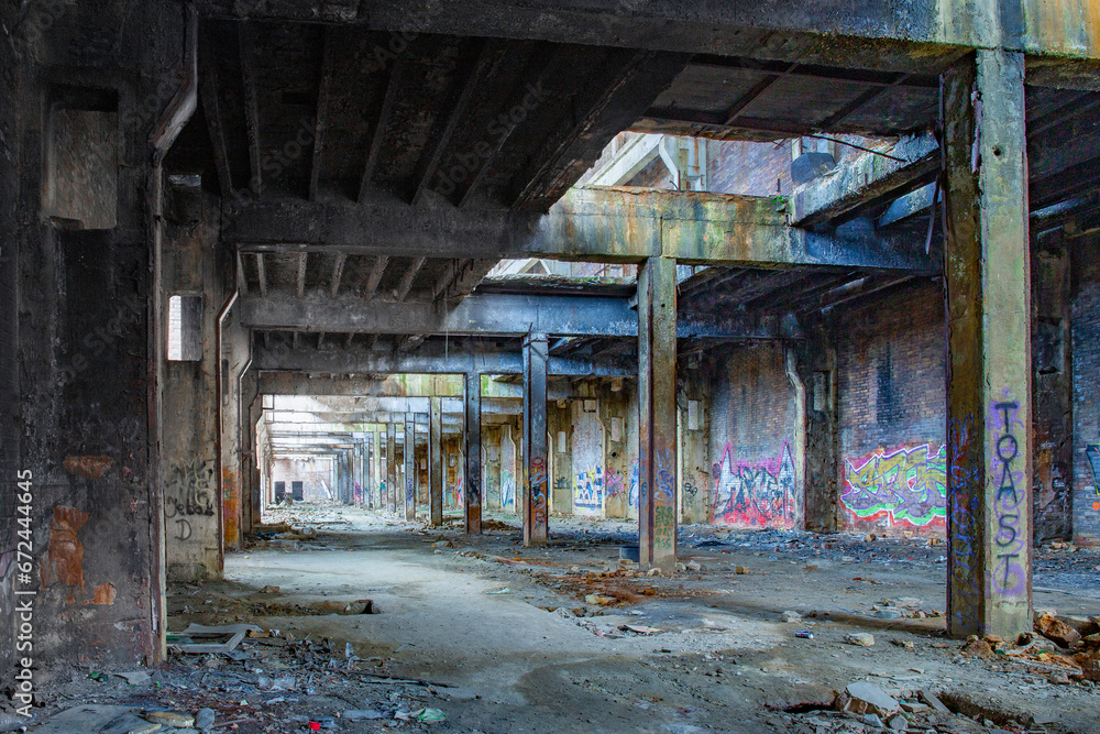 Messy abandoned factory warehouse. Creepy industrial hall