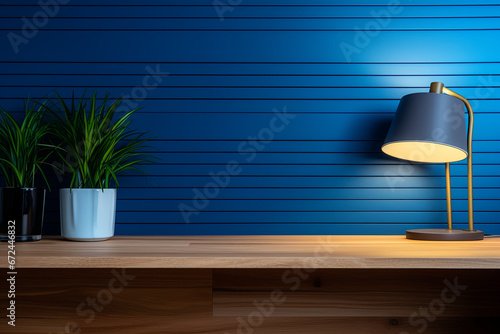 Interior Scene and Mockup. Wooden table and blue wall, green plant on the table.