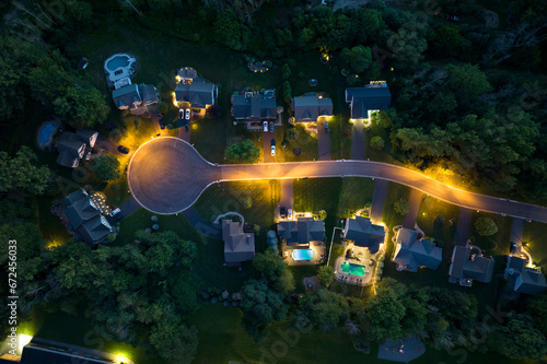 Fototapeta View from above of residential houses in living area in Rochester, NY at night