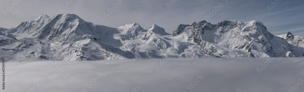 Idyllic mountain and landscape covered with snow against sky Idyllic mountain and landscape covered with snow against sky