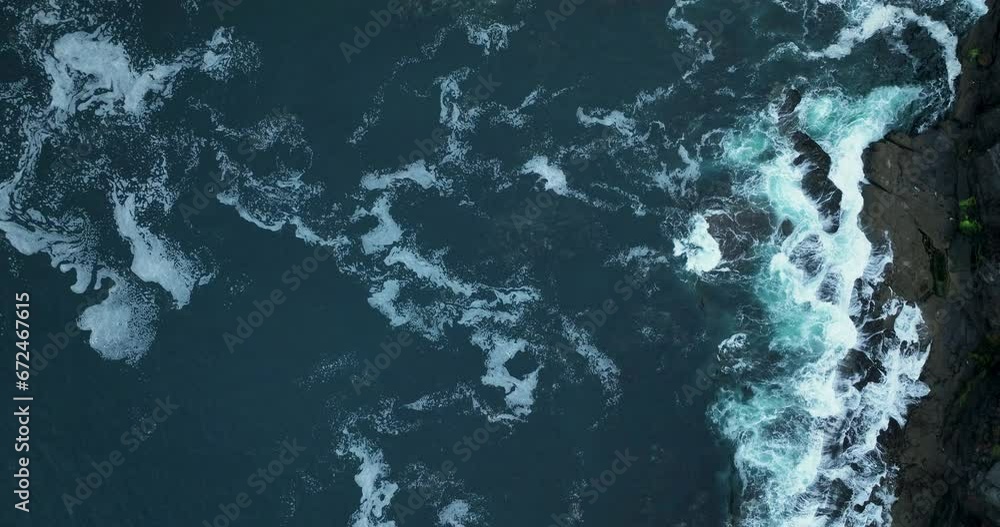 The mighty waves of the ocean crashing against the cliffs of Moher 4k The mighty waves of the ocean crashing against the cliffs of Moher 4k