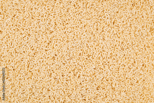 Dry pasta closeup uncooked on background