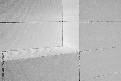 Aerated lightweight building concrete blocks prepared for building wall modular building houses. New Architecture concept photo