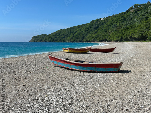 Three boats on the beach in the island