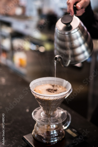 Making pour over coffee.