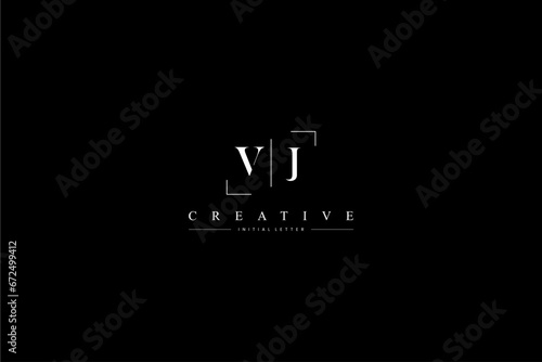 minimalist VJ initial logo with simple vertical stroke line in black photo