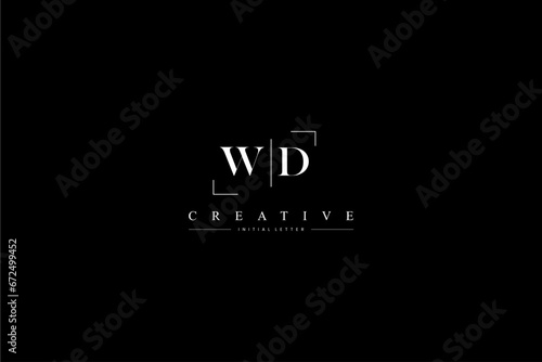 minimalist WD initial logo with simple vertical stroke line in black photo