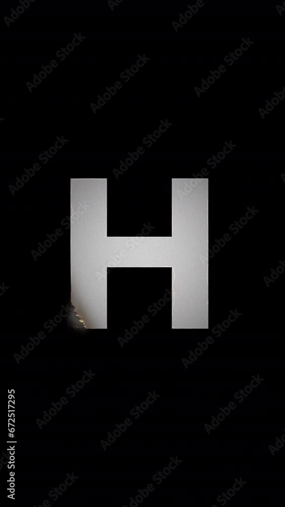 Fire letter reveal and vanish animation. H symbol burn like paper with ember and smoke on black background. Design element Fire letter reveal and vanish animation. H symbol burn like paper with ember and smoke on black background. Design element