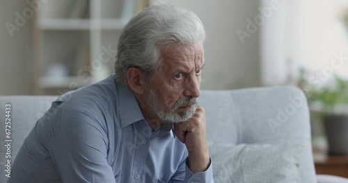 Wallpaper Mural Serious thoughtful grey haired older senior man thinking on healthcare, bored retirement, making decision, feeling doubts, looking away, touching chin, sitting on couch at home Torontodigital.ca