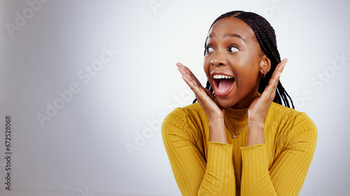 Obraz na płótnie Surprise, wow and black woman with mockup in studio for announcement, news or promo on grey background