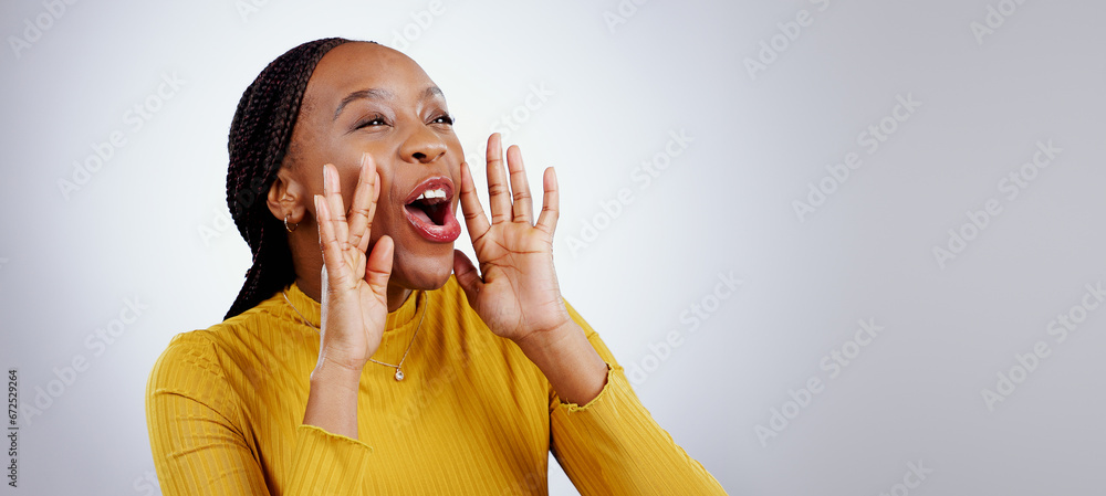 News, announcement and happy black woman shouting in studio for coming soon, deal or info on grey background. Screaming, excited and female model with emoji for giveaway, sale or sign up motivation News, announcement and happy black woman shouting in studio for coming soon, deal or info on grey background. Screaming, excited and female model with emoji for giveaway, sale or sign up motivation