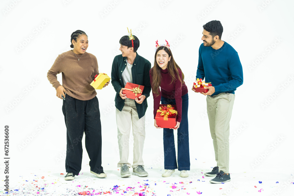 Young Asian friends man woman wearing casual clothes and holding present red box with gifts together isolated on white background studio portrait. concept new year and christmas gifts. Young Asian friends man woman wearing casual clothes and holding present red box with gifts together isolated on white background studio portrait. concept new year and christmas gifts.