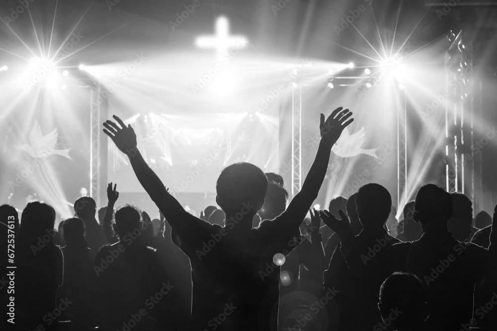 Christian worship God together in Church ,raised hand and praise the lord - obrazy, fototapety, plakaty 