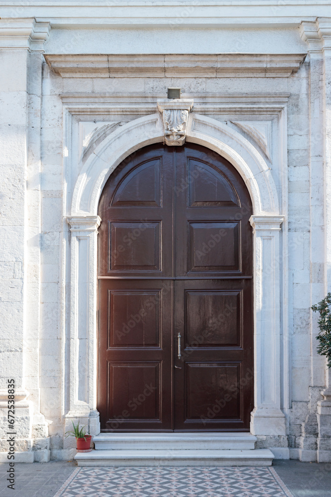 The church door is a simple and elegant architecture