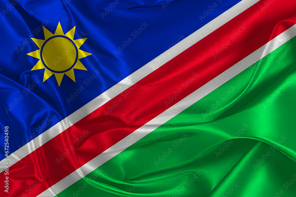 Obraz premium Waving silk flag of Namibia